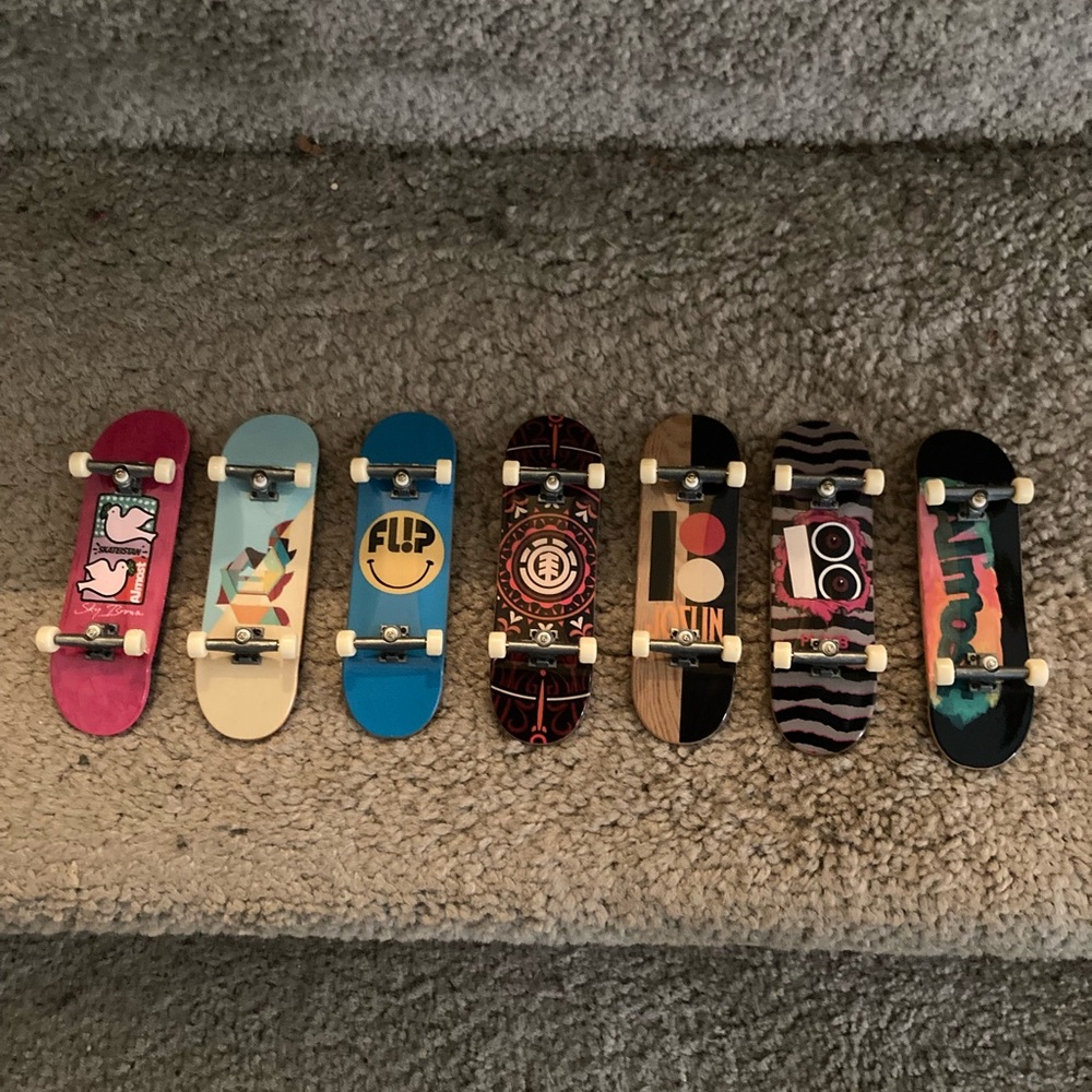 7 Vintage Tech Deck Mini Skateboards.  Never Used